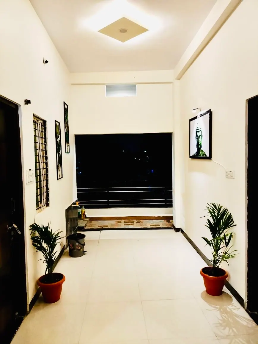 Lounge TV wall with plants at Divinestay, AP Villas Ujjain