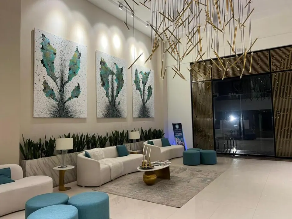 Lounge seating area at Om Shanti Stay, AP Villas Ujjain
