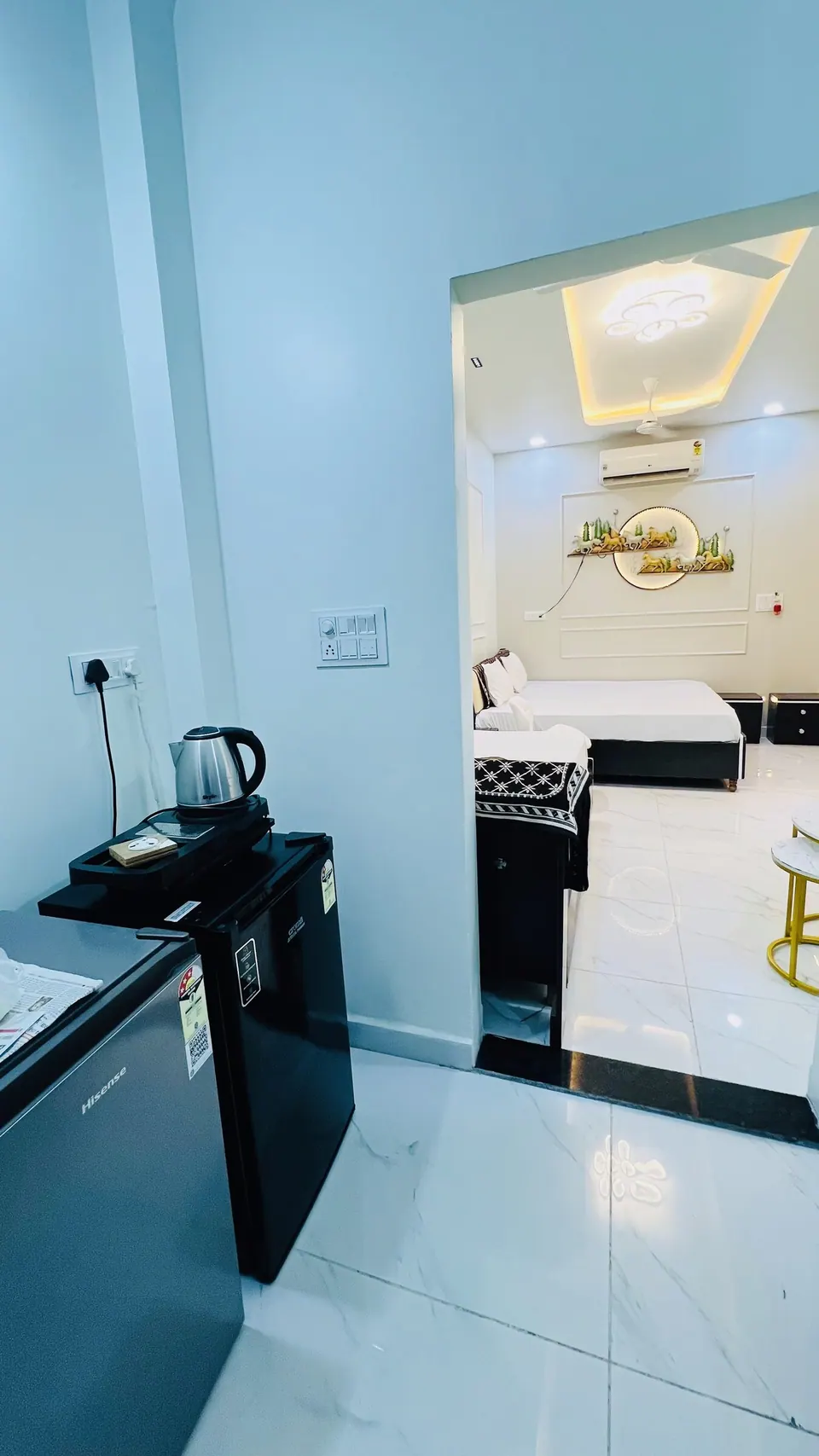 Bedroom with kettle and tray at Rudrangan Suites, AP Villas Ujjain