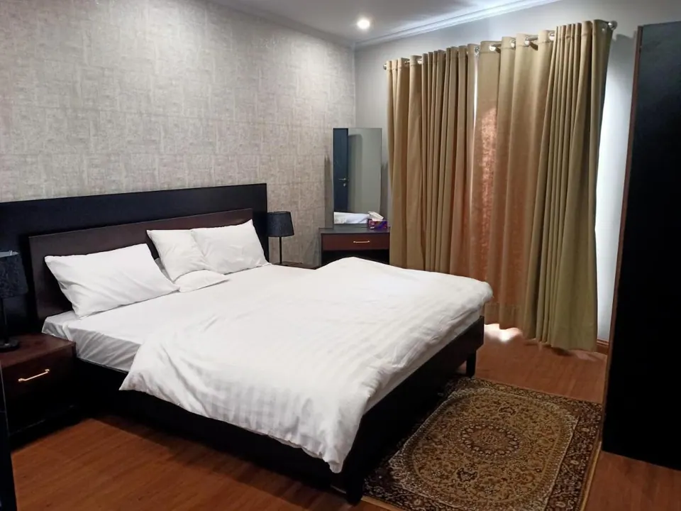 Bedroom with double bed at Villa Aranya, AP Villas Ujjain